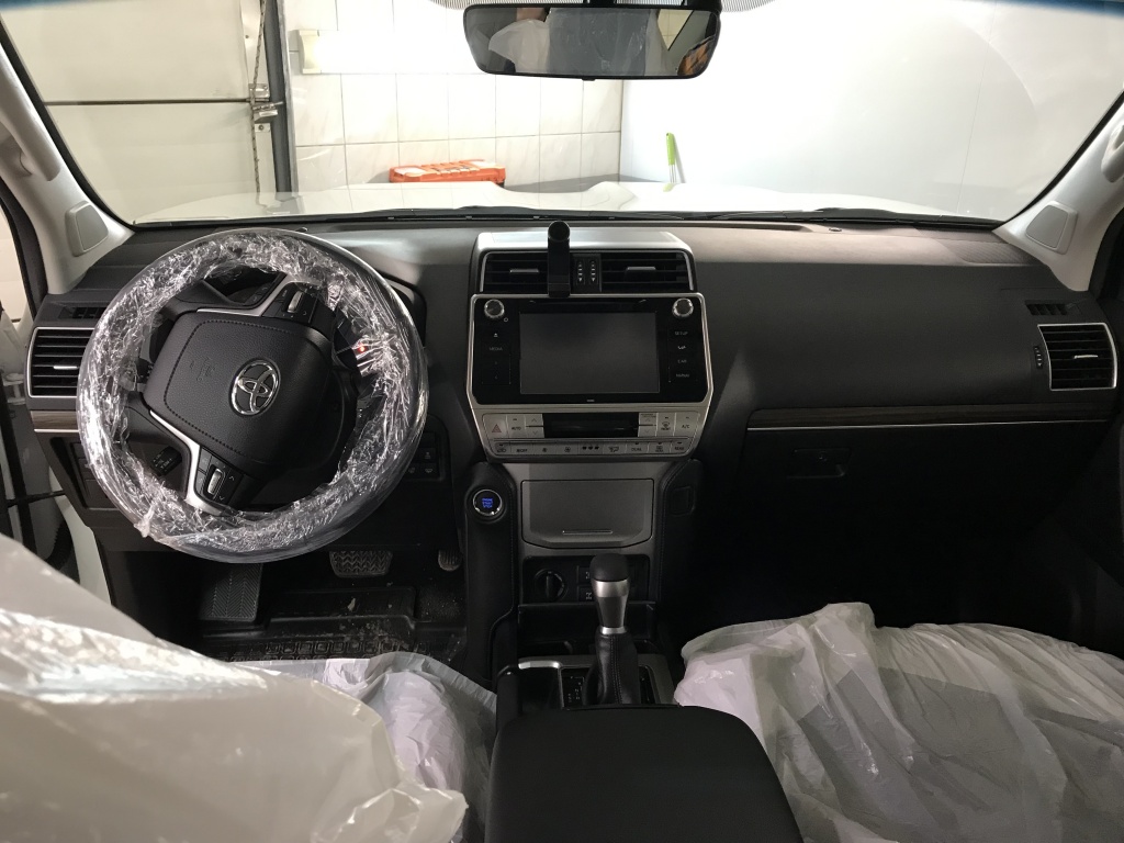 Установка сигнализации Pandora DXL4970 с автозапуском, установка сетки в бампер, установка замков капота на Toyota Land Cruiser Prado 150 в Пушкино и в Королёве
